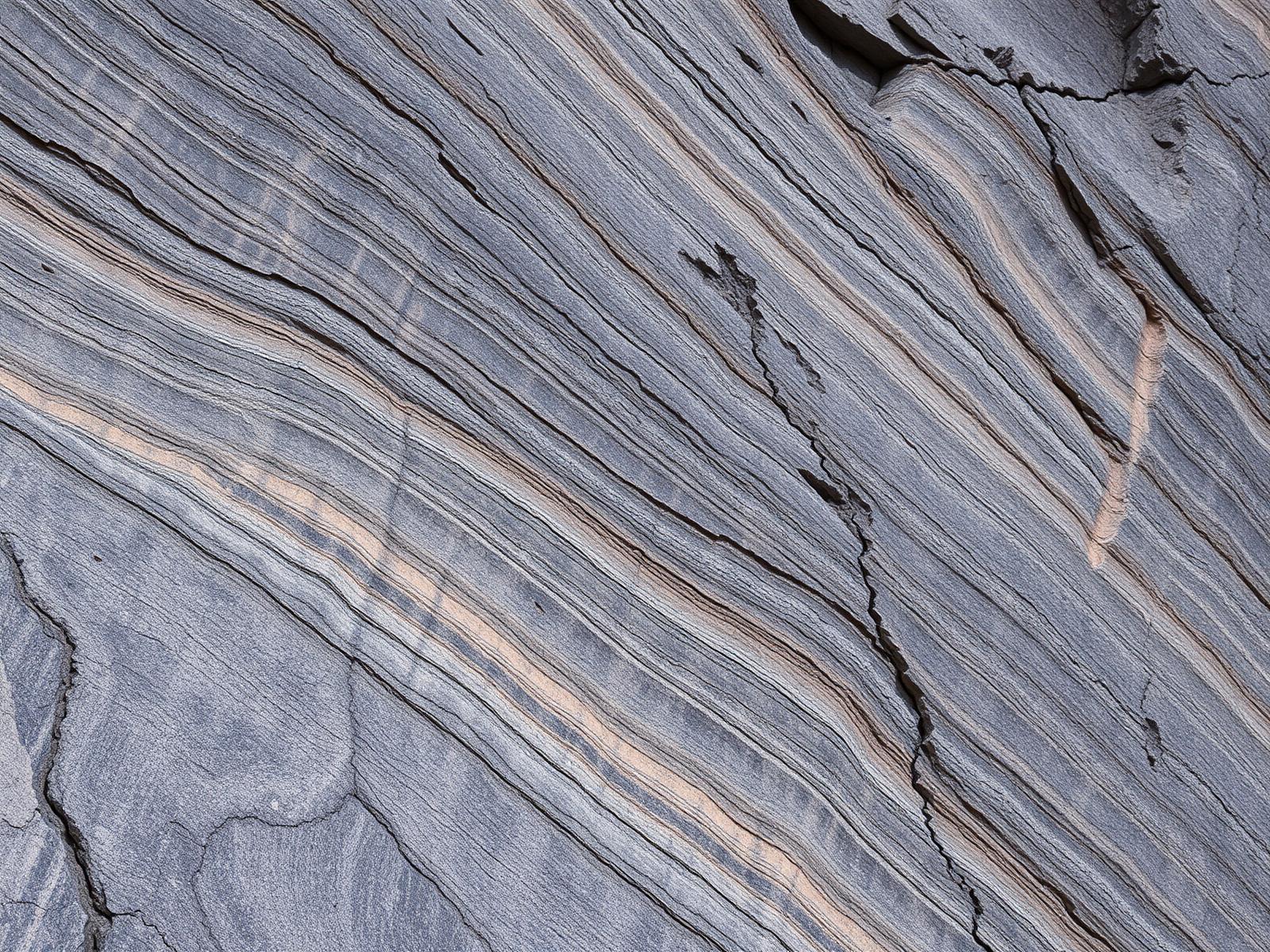 Banded strata of the open-face granite quarry